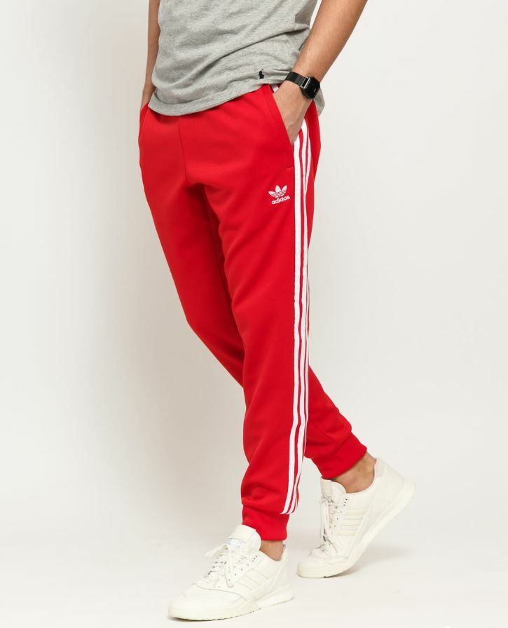 red adidas cuffed track pants